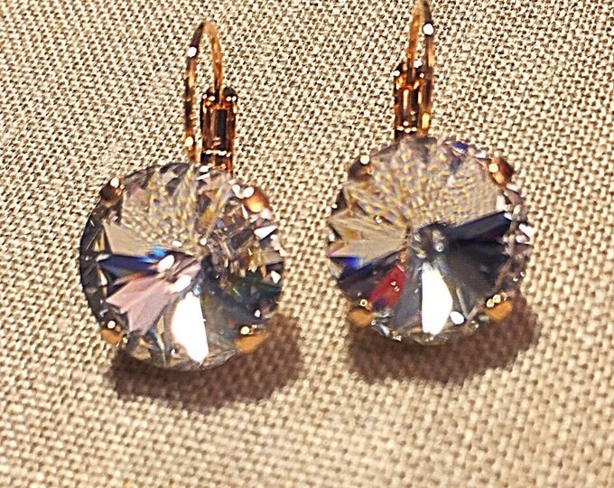 Timeless, elegant clear Swarovski crystals dangle, drop, lever back earrings with rose-gold plated prong settings and lever-back closures