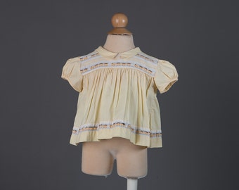 Vintage 1960s baby girl's yellow train top
