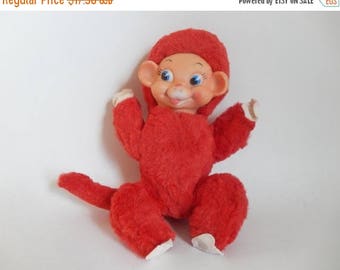 red stuffed monkey