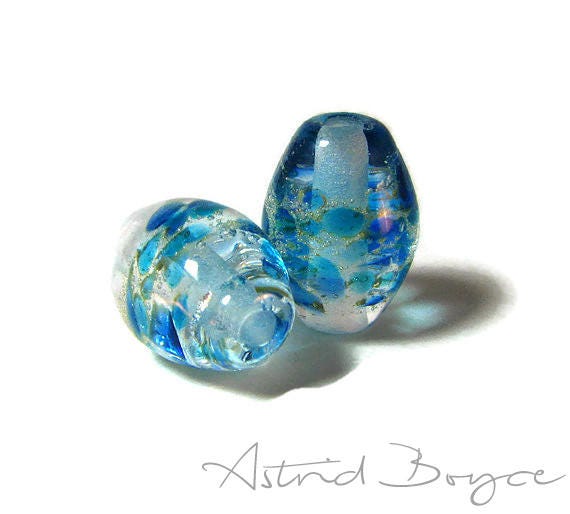Frozen Ovals Artisan Lampwork Bead Pair - Capri Blue Glass paired with fine Italian Silver - these pair perfectly with 2mm Natural Leather
