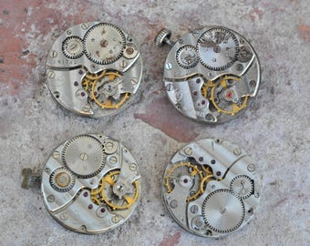 0.9 inch Set of 4 vintage wrist watch movements.