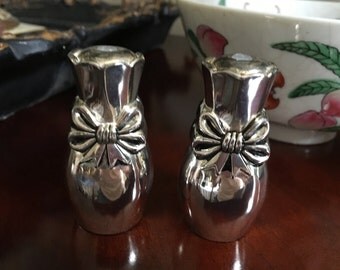Vintage silver plated salt and pepper shakers with bows
