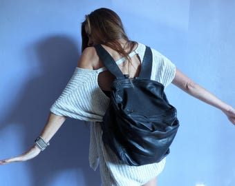 Backpack cube in black leather, multipoches