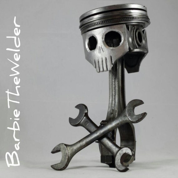 Piston skull and crossbones welded metal art sculpture