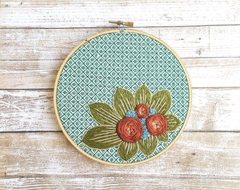 floral embroidery hoop art/modern blackwork/green and orange decor/floral wall art/embroidered wall art/modern embroidery/embroidered flower