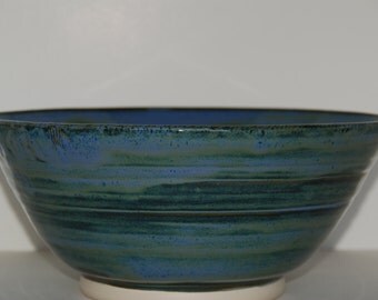 Large handmade pottery bowl. Large handmade bowl with shells.