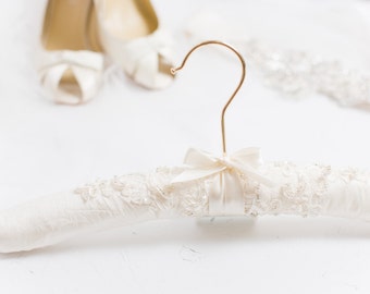 Items similar to White wedding  gown  hanger  with blush  pink 