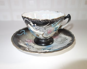 Japanese embossed dragons cup and saucer set