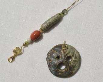 Three Hole Pottery Diz in Green Tones with Embossed Bamboo Leaf Pattern for Making Roving to Spin Yarn