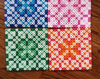 Set of 8 fruit-themed Perler bead coasters