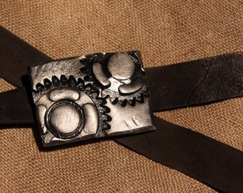 Hand forged belt buckle