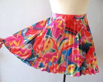 80s tennis skirt - vintage bright neon loud multicolor rainbow geometric abstract pleated mini athletic athleisure Lily's Beverly Hills