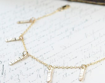 Delicate Gold Charm Bracelet