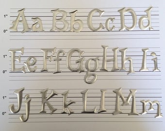 Small Metal Letters, Numbers and Punctuation. Silver. 29 cents each. Metal Letters. Sign Making Letters. Silver Metal Letters.