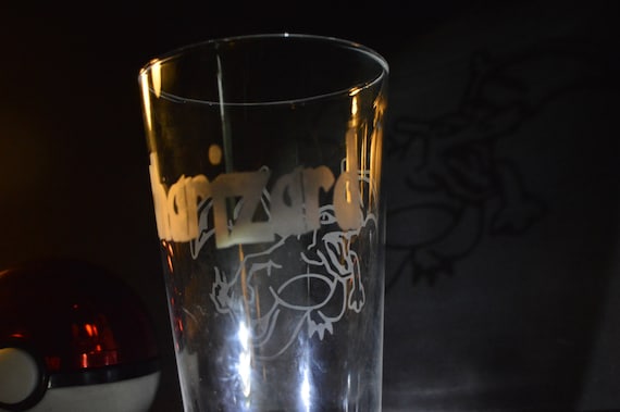 Pick a poke any pokemon pub glass with the poke-name on the back and the # on the bottom