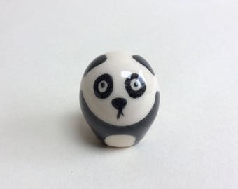 Small handmade pottery panda. Each one is unique. Thrown on the potter's wheel and individually painted with delicate brushwork.