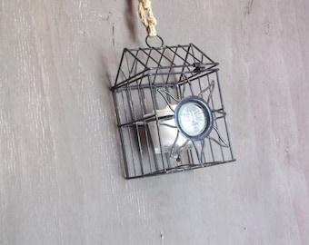 rustic wire cage, flip top, candle included, long life battery, glass votive holder, man in the moon, etched glass, sun dial, nightlight,