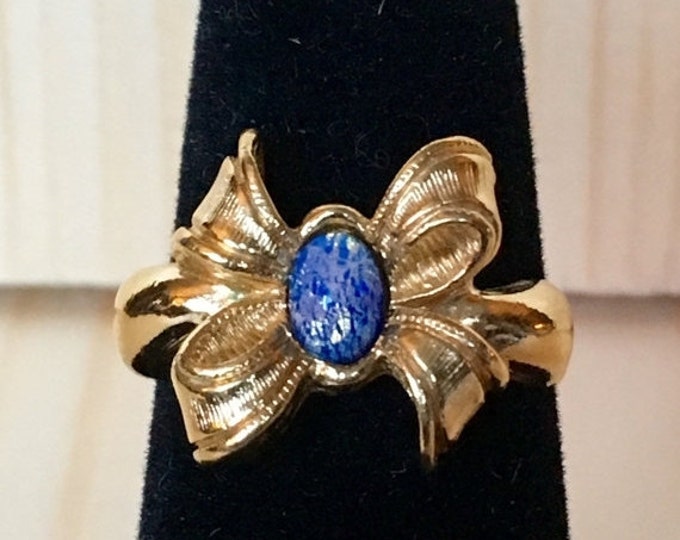 Storewide 25% Off SALE Vintage Gold Tone Cobalt Blue Cabochon Avon Cocktail Ring Featuring Elegant Bow Shaped Design