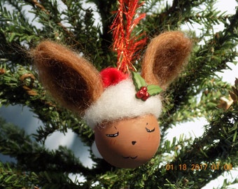 Mini Eevee Pokemon hand painted 2 inch glass ball with santa hat and felted ears