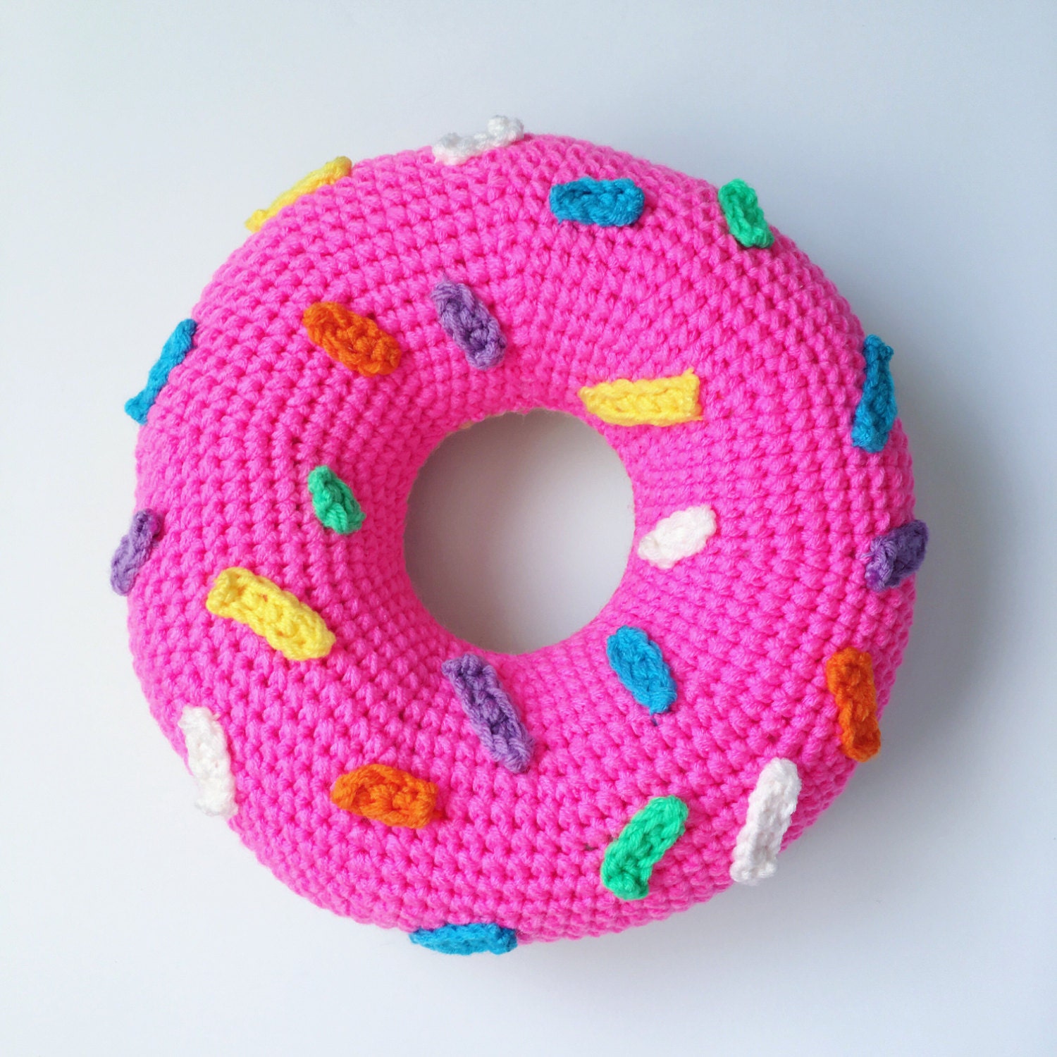 Crochet Pink Frosted Donut Pillow with Rainbow Sprinkles