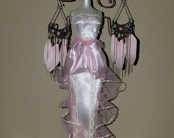 Victorian mannequin jewelry stand with earrings