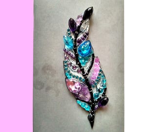 Feather-handmade brooch from stones and beads
