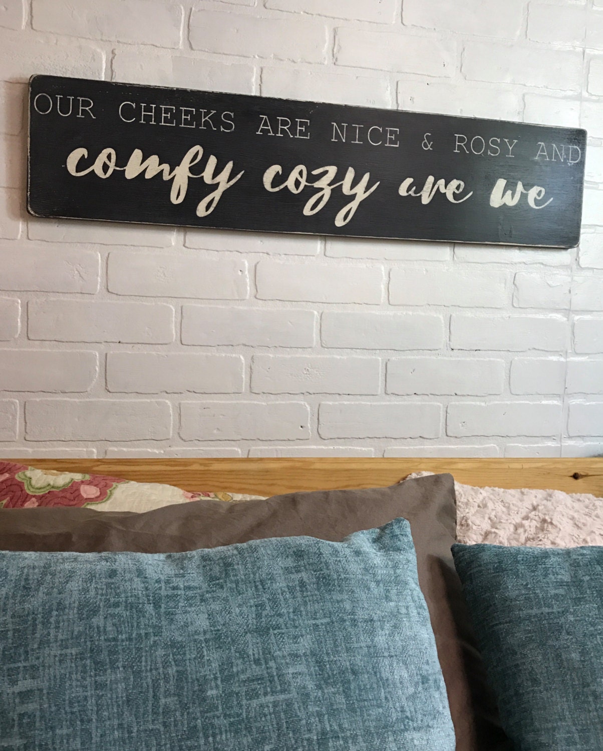 Our cheeks are nice and rosy and comfy cozy are we bedroom