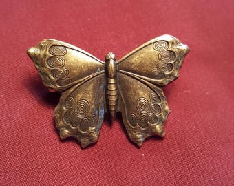 Beautiful butterfly pin with art deco design on wings