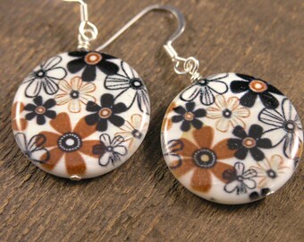 Brown and black flowers on large white shell beads handmade silver earrings
