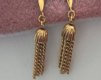 Items similar to Gold Tassel Clip On Earrings on Etsy