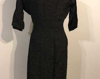 Stunning 1950s black wiggle dress