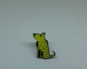 A quirky yellow dog enamel brooch pin