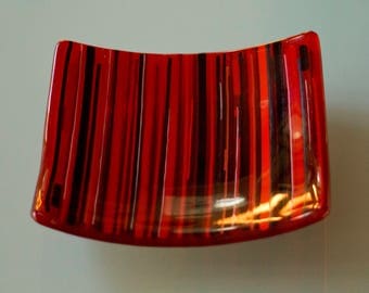 Red and black striped sushi platter