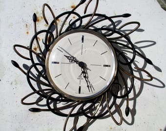 50s French wall clock, mid century modern Jaz swirly gold tone and black brass atomic / MCM