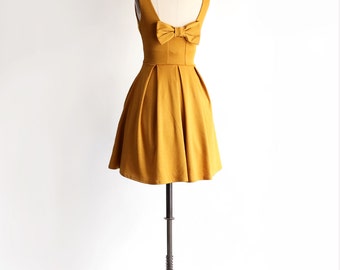 JANUARY | Golden - mustard yellow bridesmaid dress with bow. vintage inspired cocktail dress. mod retro dress with full skirt + pockets