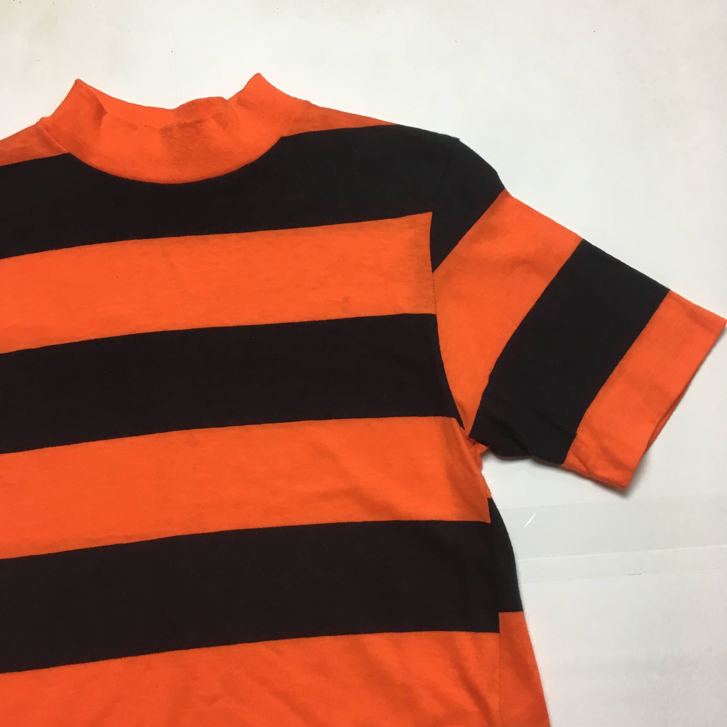 black orange and white shirt