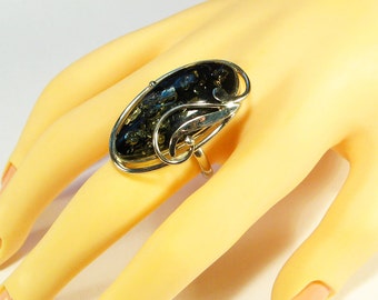 Natural green Baltic amber ring.