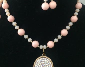 Long pale pink beaded necklace with pave, aurora borealis pendent in gold tone with matching earrings statement, fashion, Kendra Scott style