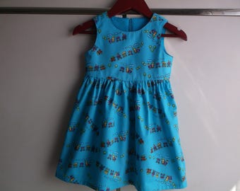 Trains on turquoise dress