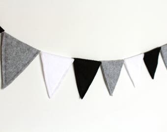 Cheerful flags line of felt black, a party