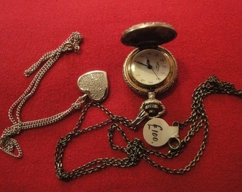 Silver ladies pocket watch by rotary and a silver pendant