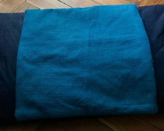 Pillowcase in elegant fabric processing sackcloth piece teal blue