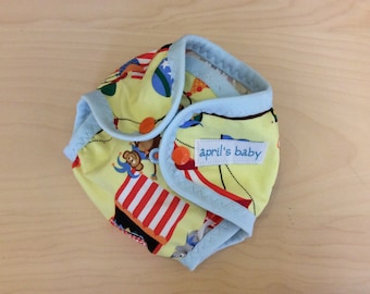 Newborn waterproof cloth diaper cover - fits 6-12 lbs, at the circus