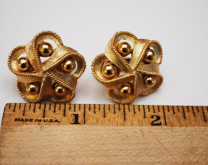 Crown Trifari Earrings - gold ribbon swirl flower - Clip on earrings