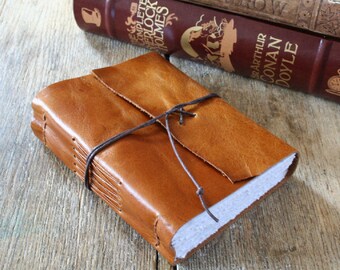 Leather Journal . "Be yourself, everyone else is taken" - Oscar Wilde quote . handmade handbound . rich golden tan (320 pgs)