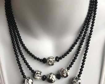 Black and white graduated layers necklace and earring set