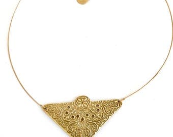 serious necklace bronze gold arabesques.