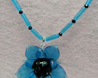 Turquoise and black glass daisy flower necklace and earrings set