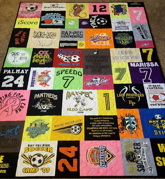 Mosaic tshirt quilt made from 10-55 t shirts. T-shirt quilt