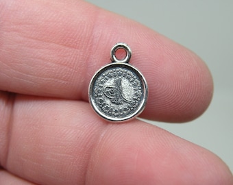 10 Silver Tone Small Coin Charms. B-021
